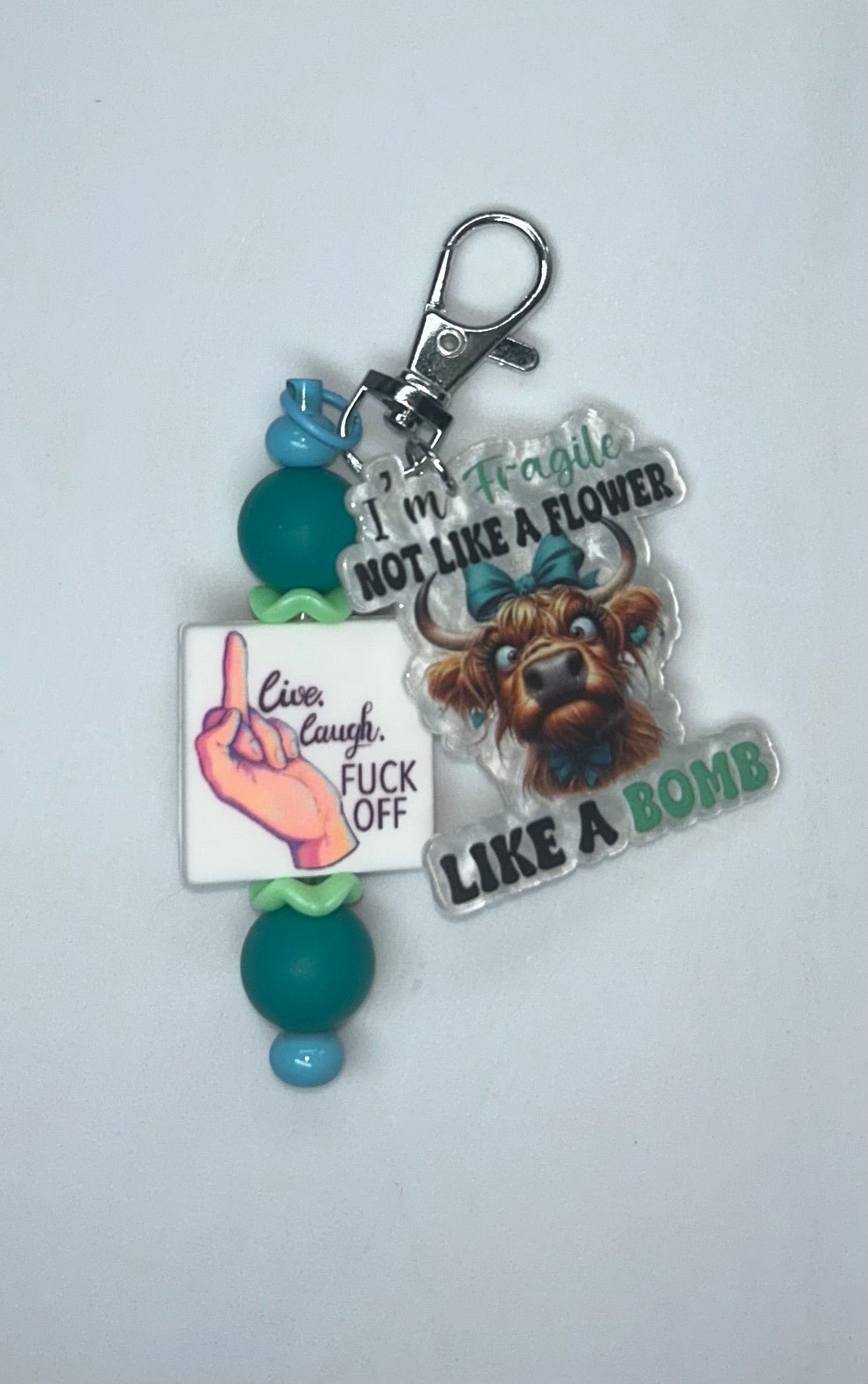I'm Not Fragile Like A Flower Key Chain