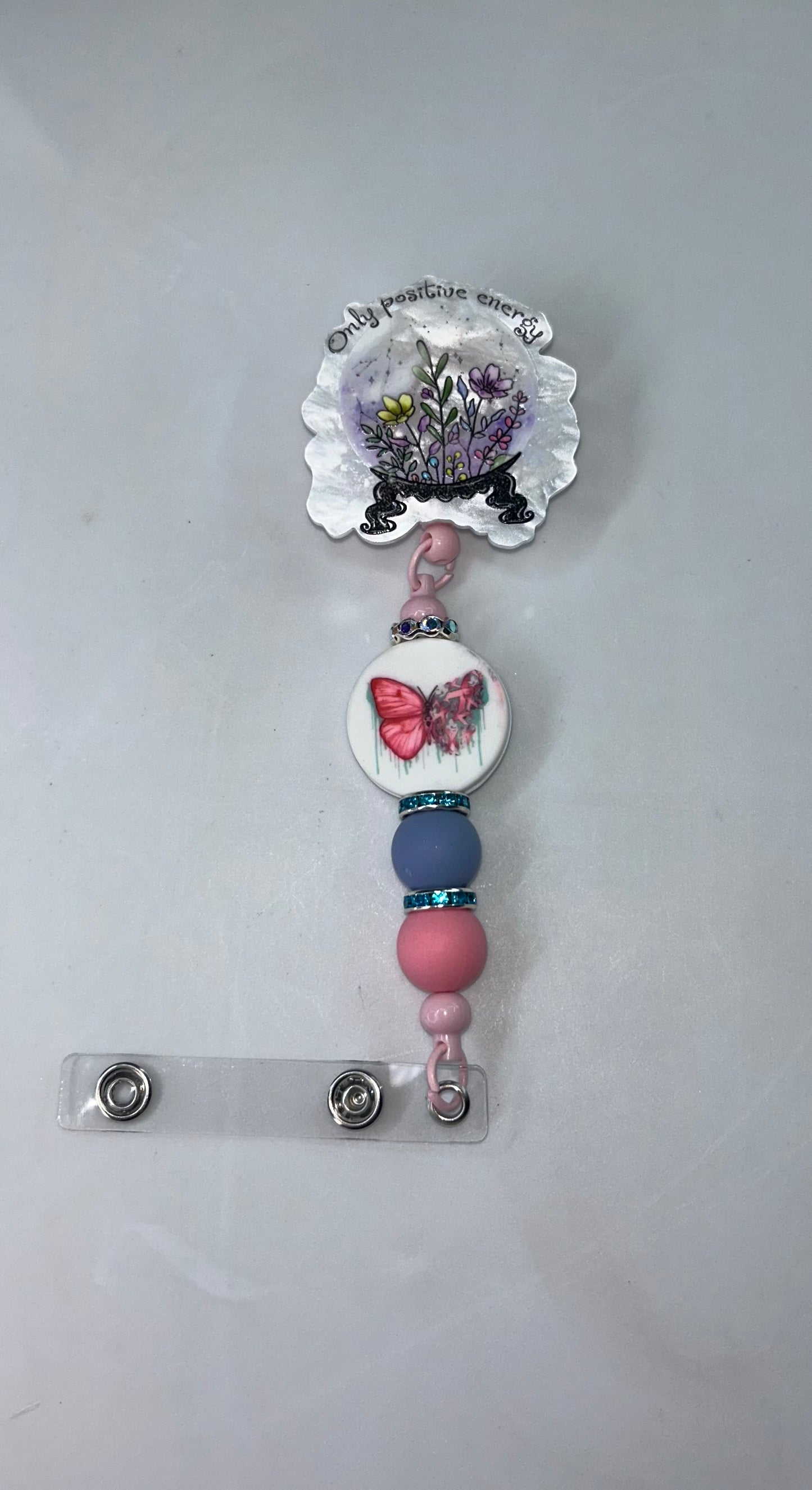 Only Positive Energy Butterfly Badge Reel