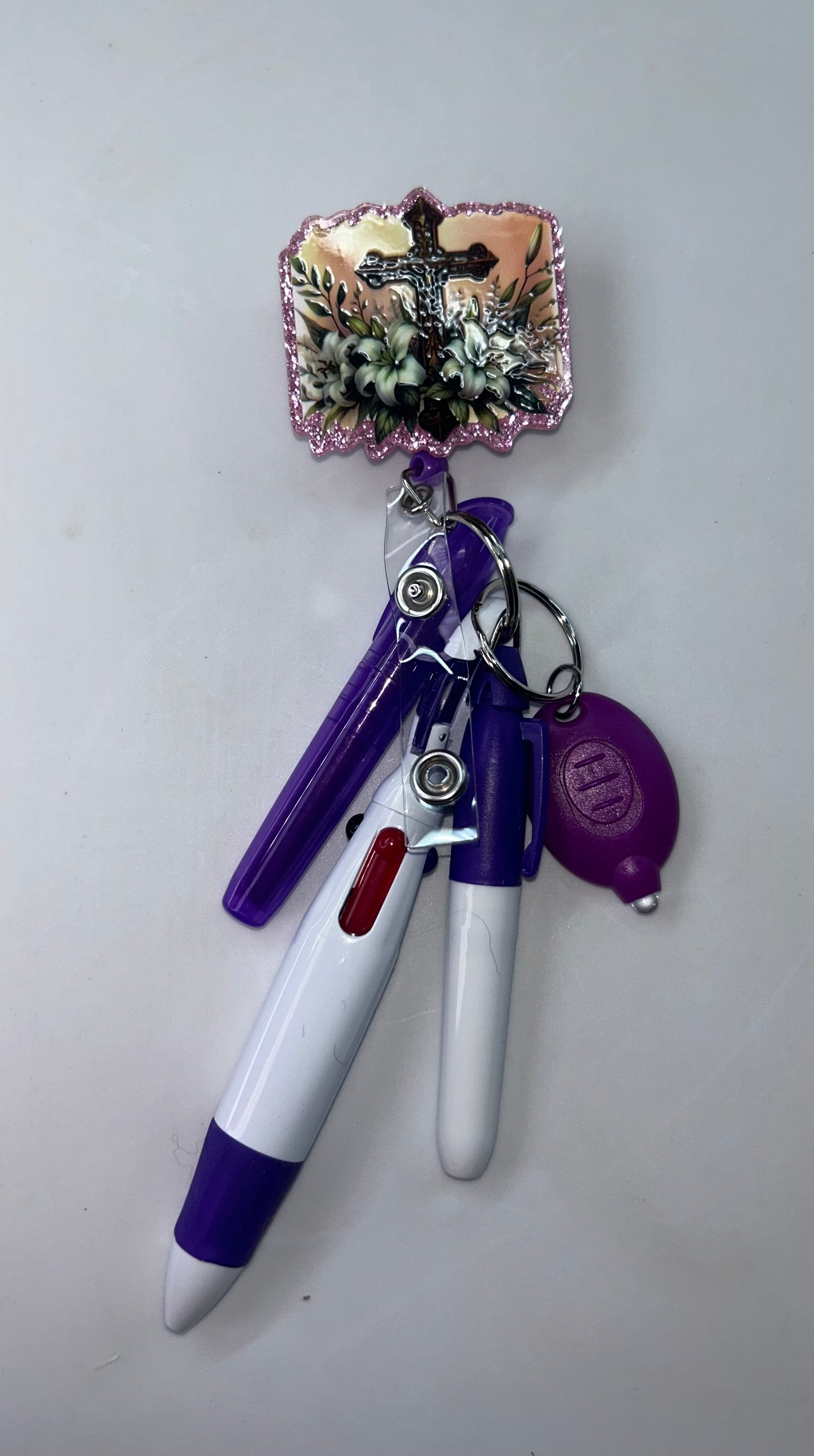 Cross Purple Badge Reel
