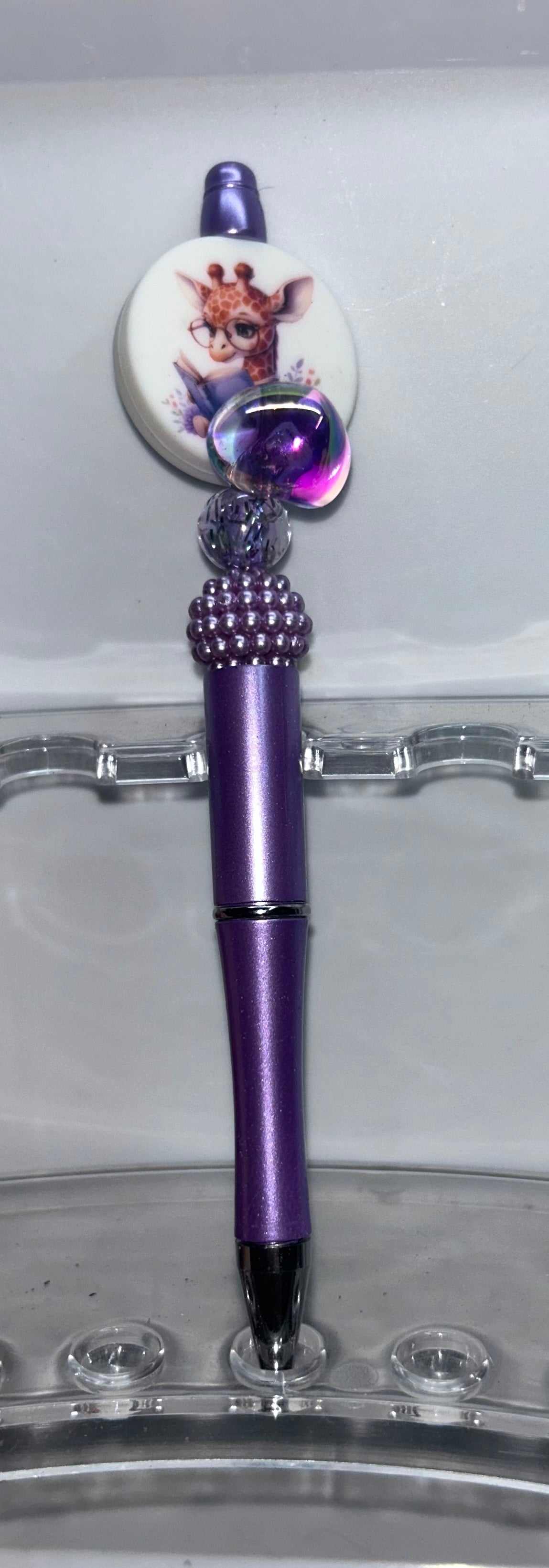 Giraffe Reading Book Purple Pen