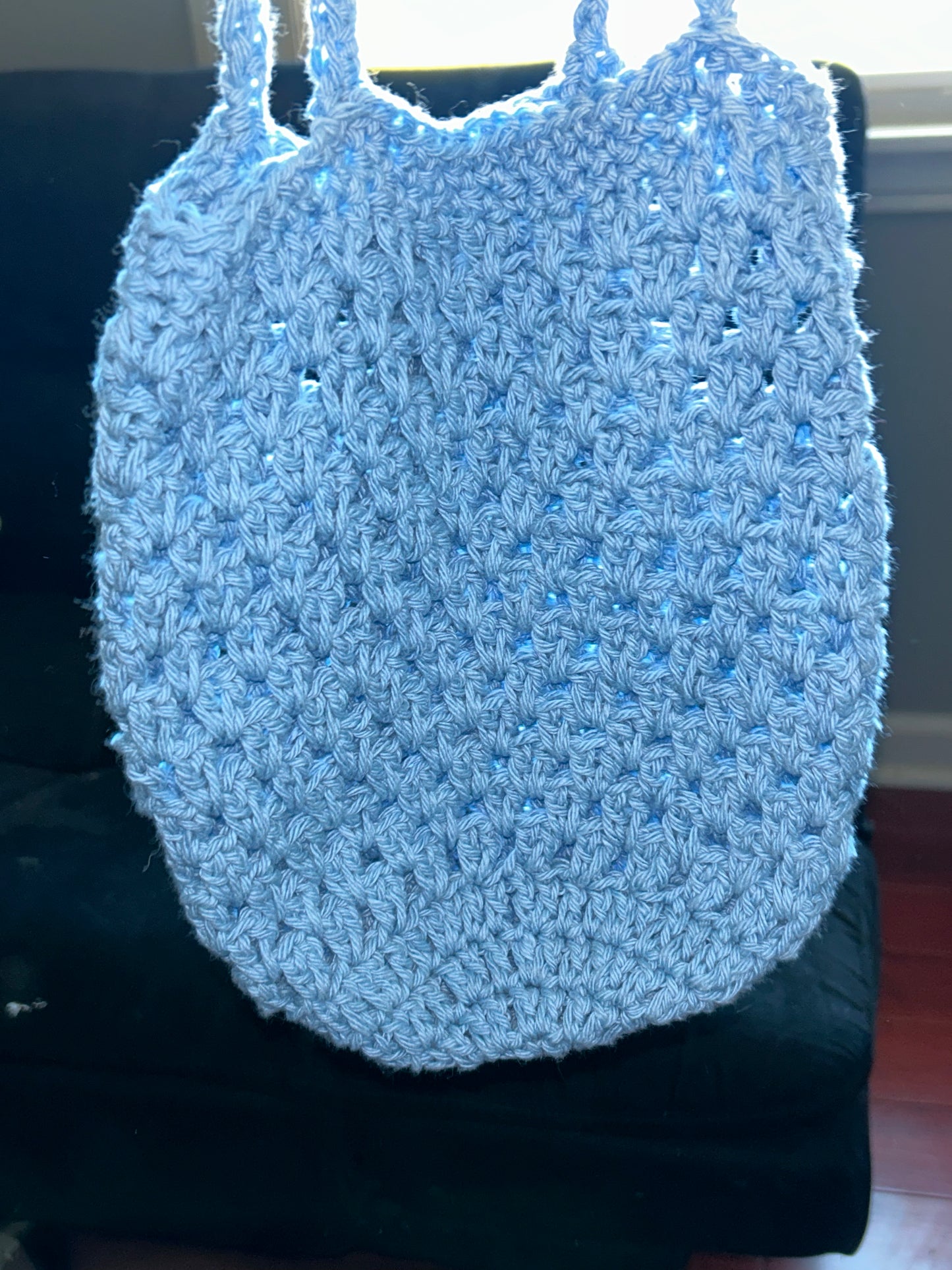 Blue crocheted plant hanger