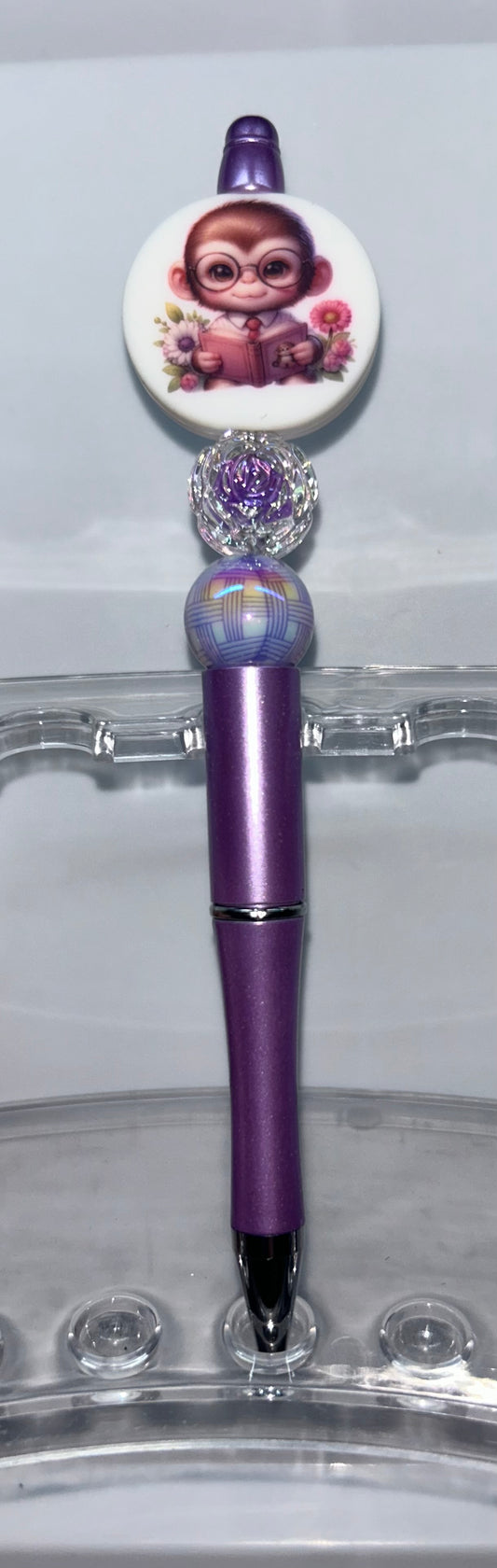 Monkey Reading A Book Purple Pen