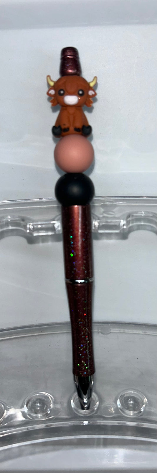 Sitting Highland Cown Burgandy Pen