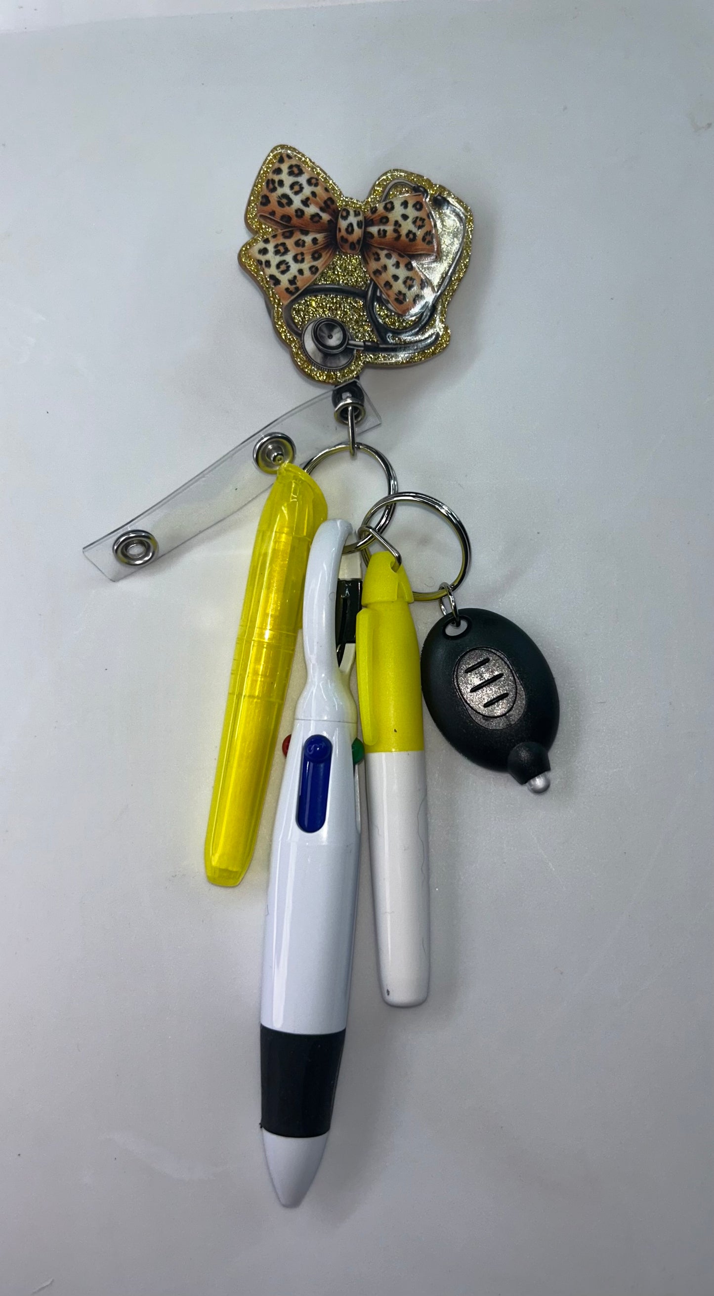 Leopard Bow Badge Reel